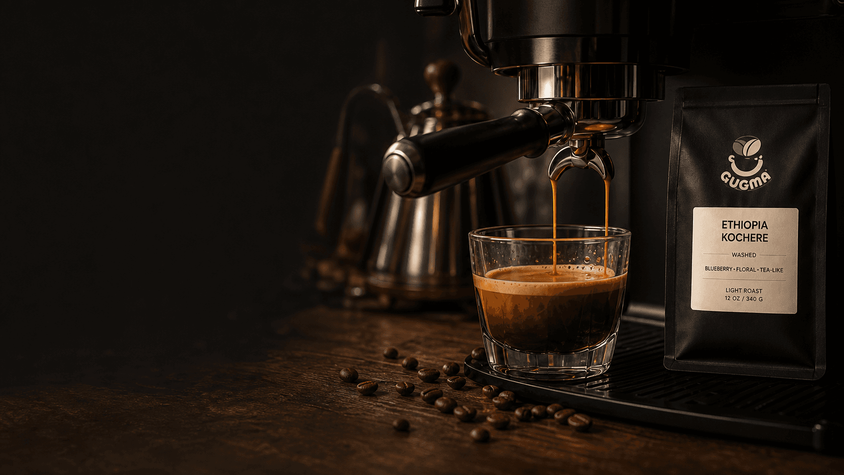 Espresso pouring into a glass beside Gugma coffee